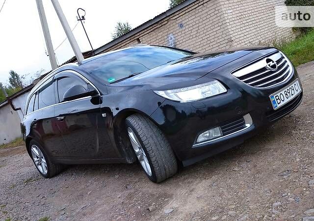 Черный Опель Insignia Sports Tourer, объемом двигателя 2 л и пробегом 202 тыс. км за 9550 $, фото 1 на Automoto.ua