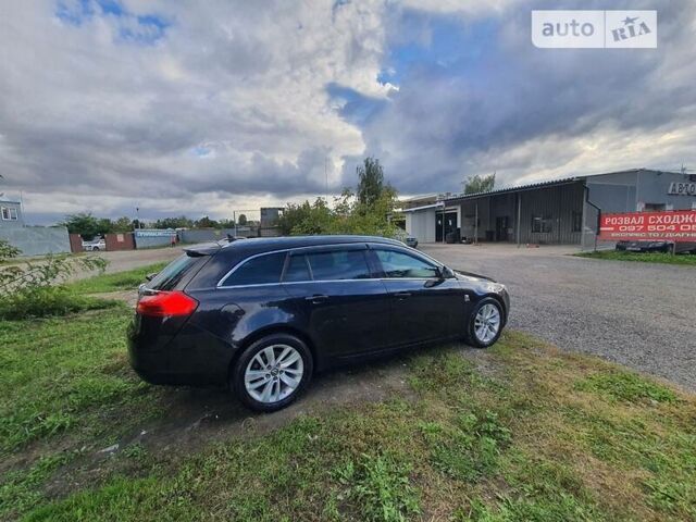 Чорний Опель Insignia Sports Tourer, об'ємом двигуна 2 л та пробігом 290 тис. км за 8800 $, фото 4 на Automoto.ua