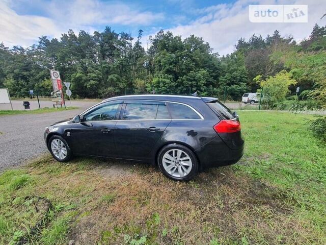 Чорний Опель Insignia Sports Tourer, об'ємом двигуна 2 л та пробігом 290 тис. км за 8800 $, фото 2 на Automoto.ua