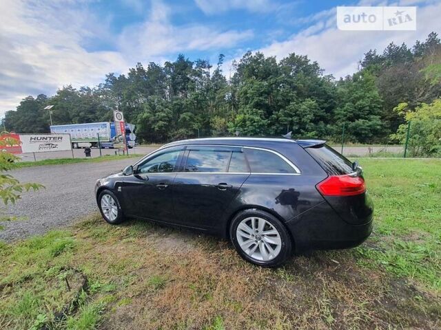 Чорний Опель Insignia Sports Tourer, об'ємом двигуна 2 л та пробігом 290 тис. км за 8800 $, фото 1 на Automoto.ua