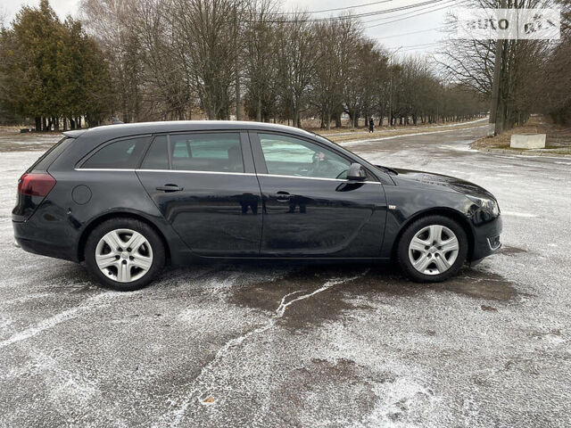 Черный Опель Insignia Sports Tourer, объемом двигателя 2 л и пробегом 220 тыс. км за 7500 $, фото 5 на Automoto.ua