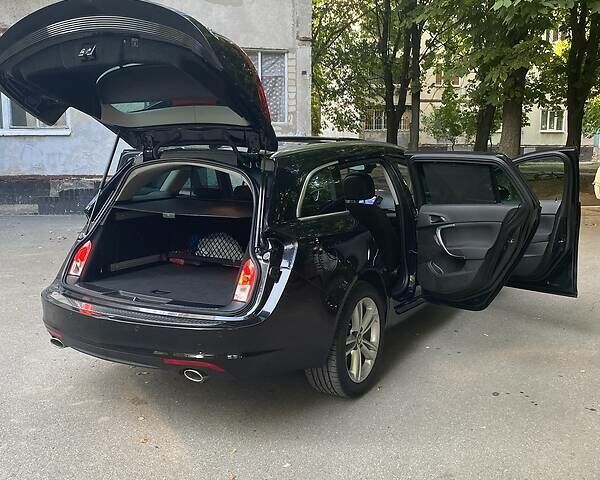 Черный Опель Insignia Sports Tourer, объемом двигателя 2 л и пробегом 173 тыс. км за 11450 $, фото 20 на Automoto.ua