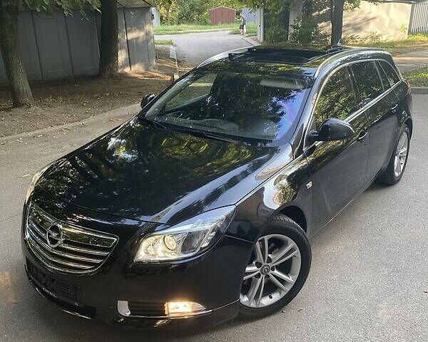 Черный Опель Insignia Sports Tourer, объемом двигателя 2 л и пробегом 173 тыс. км за 11450 $, фото 10 на Automoto.ua