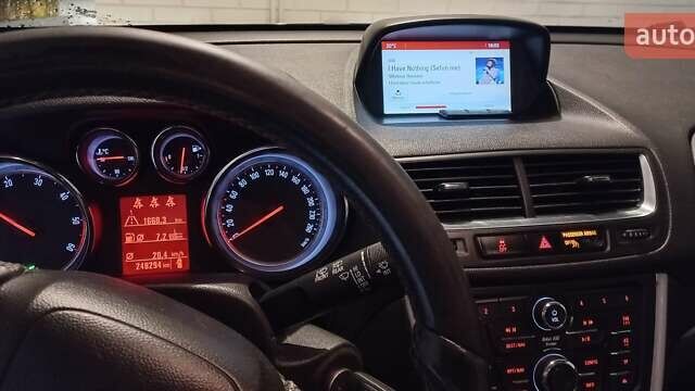 Чорний Опель Mokka, об'ємом двигуна 1.6 л та пробігом 248 тис. км за 12500 $, фото 8 на Automoto.ua