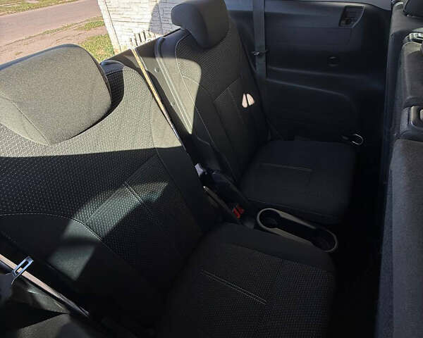 Черный Опель Zafira Tourer, объемом двигателя 1.6 л и пробегом 213 тыс. км за 9500 $, фото 25 на Automoto.ua
