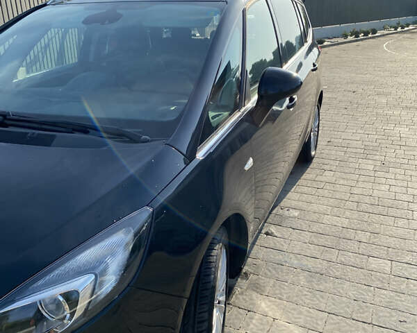Чорний Опель Zafira Tourer, об'ємом двигуна 1.6 л та пробігом 280 тис. км за 11500 $, фото 1 на Automoto.ua