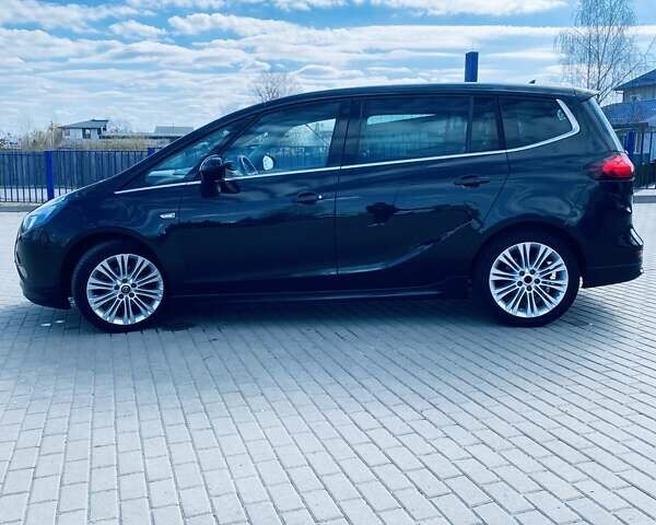 Черный Опель Zafira Tourer, объемом двигателя 1.6 л и пробегом 212 тыс. км за 11000 $, фото 1 на Automoto.ua
