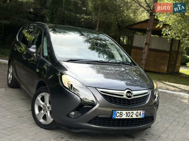 Серый Опель Zafira Tourer, объемом двигателя 2 л и пробегом 219 тыс. км за 10470 $, фото 19 на Automoto.ua