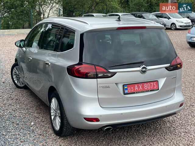 Серый Опель Zafira Tourer, объемом двигателя 2 л и пробегом 195 тыс. км за 11555 $, фото 24 на Automoto.ua