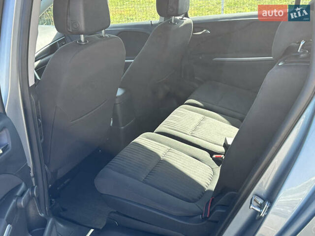 Серый Опель Zafira Tourer, объемом двигателя 2 л и пробегом 227 тыс. км за 8399 $, фото 18 на Automoto.ua