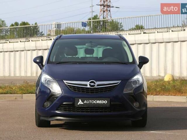 Синий Опель Zafira Tourer, объемом двигателя 1.6 л и пробегом 173 тыс. км за 9000 $, фото 1 на Automoto.ua