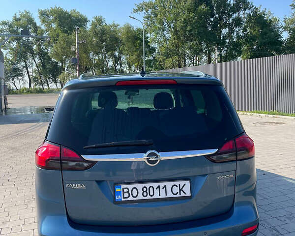Синий Опель Zafira Tourer, объемом двигателя 1.6 л и пробегом 240 тыс. км за 9600 $, фото 1 на Automoto.ua