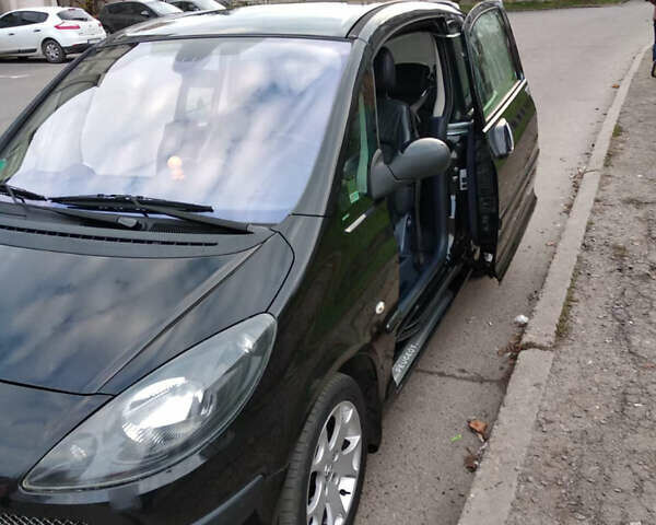 Черный Пежо 1007, объемом двигателя 1.6 л и пробегом 189 тыс. км за 4800 $, фото 9 на Automoto.ua