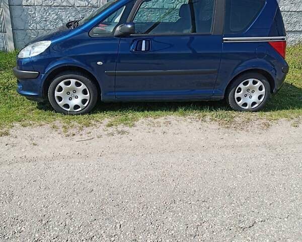 Синий Пежо 1007, объемом двигателя 1.4 л и пробегом 225 тыс. км за 3700 $, фото 4 на Automoto.ua