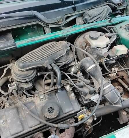 Зеленый Пежо 106, объемом двигателя 1.1 л и пробегом 317 тыс. км за 1200 $, фото 1 на Automoto.ua