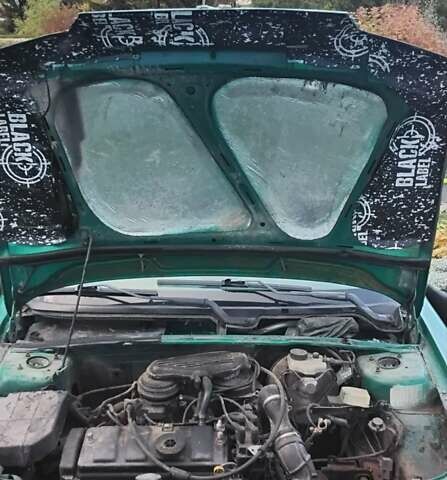 Зеленый Пежо 106, объемом двигателя 1.1 л и пробегом 317 тыс. км за 1200 $, фото 5 на Automoto.ua