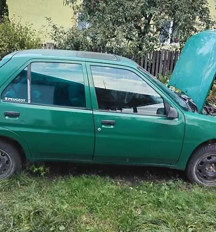 Зеленый Пежо 106, объемом двигателя 1.1 л и пробегом 317 тыс. км за 1200 $, фото 6 на Automoto.ua
