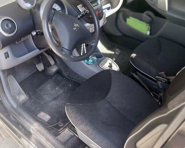 Черный Пежо 107, объемом двигателя 1 л и пробегом 58 тыс. км за 5600 $, фото 3 на Automoto.ua