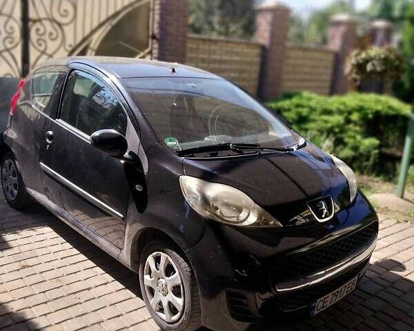 Черный Пежо 107, объемом двигателя 1 л и пробегом 58 тыс. км за 5600 $, фото 1 на Automoto.ua