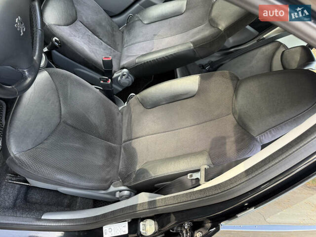 Черный Пежо 107, объемом двигателя 1 л и пробегом 113 тыс. км за 5200 $, фото 10 на Automoto.ua