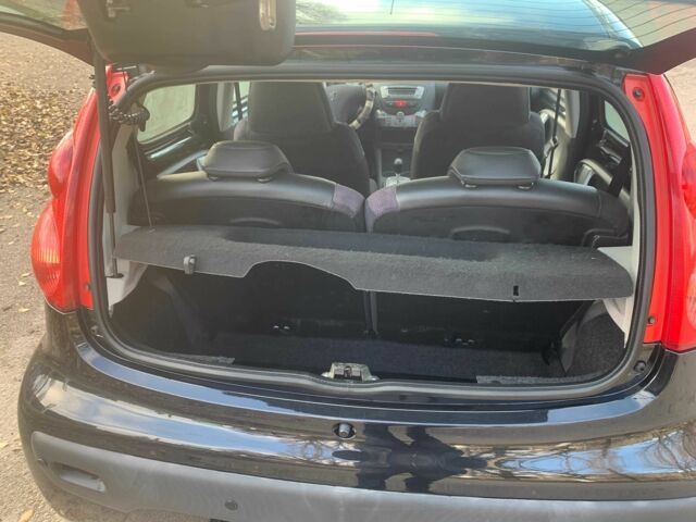 Черный Пежо 107, объемом двигателя 1 л и пробегом 130 тыс. км за 5500 $, фото 4 на Automoto.ua