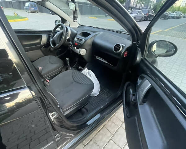 Черный Пежо 107, объемом двигателя 1 л и пробегом 167 тыс. км за 5000 $, фото 10 на Automoto.ua