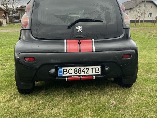 Черный Пежо 107, объемом двигателя 1 л и пробегом 200 тыс. км за 3500 $, фото 14 на Automoto.ua