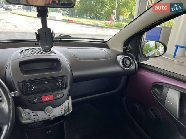 Фиолетовый Пежо 107, объемом двигателя 1 л и пробегом 159 тыс. км за 5600 $, фото 25 на Automoto.ua