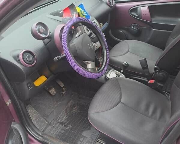 Фиолетовый Пежо 107, объемом двигателя 1 л и пробегом 128 тыс. км за 6999 $, фото 4 на Automoto.ua