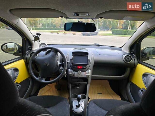 Желтый Пежо 107, объемом двигателя 1 л и пробегом 284 тыс. км за 5100 $, фото 13 на Automoto.ua