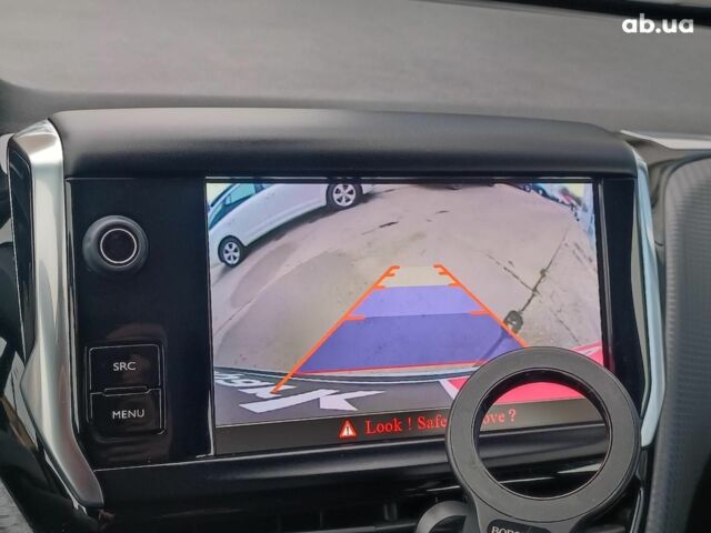 Белый Пежо 2008, объемом двигателя 1.2 л и пробегом 79 тыс. км за 11990 $, фото 27 на Automoto.ua