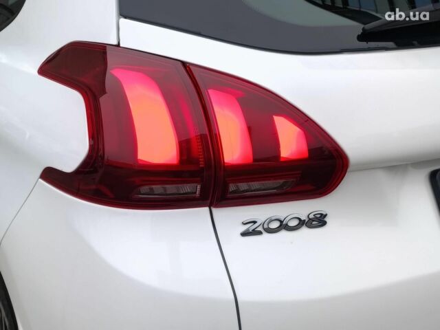 Белый Пежо 2008, объемом двигателя 1.2 л и пробегом 79 тыс. км за 11990 $, фото 8 на Automoto.ua