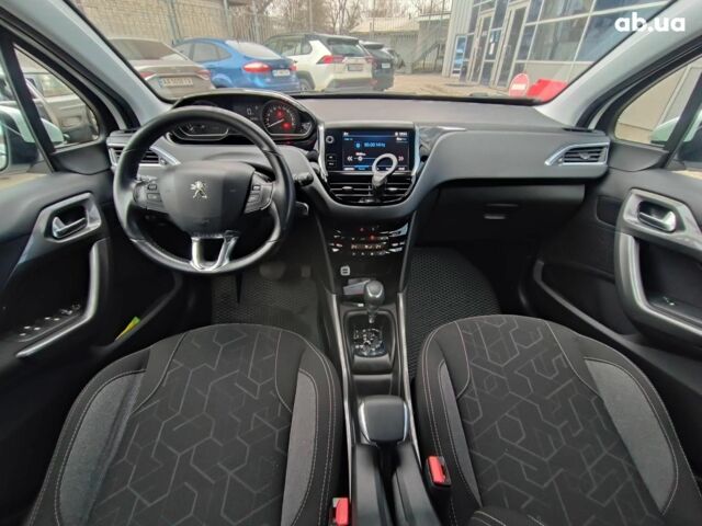 Белый Пежо 2008, объемом двигателя 1.2 л и пробегом 79 тыс. км за 11990 $, фото 13 на Automoto.ua