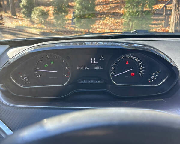 Белый Пежо 2008, объемом двигателя 1.2 л и пробегом 121 тыс. км за 9900 $, фото 12 на Automoto.ua