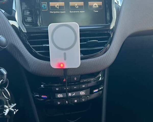 Білий Пежо 2008, об'ємом двигуна 1.2 л та пробігом 118 тис. км за 9000 $, фото 18 на Automoto.ua