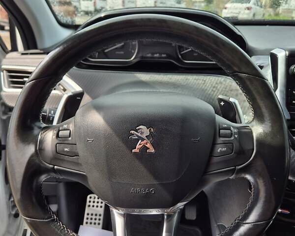 Білий Пежо 2008, об'ємом двигуна 1.2 л та пробігом 84 тис. км за 9999 $, фото 27 на Automoto.ua