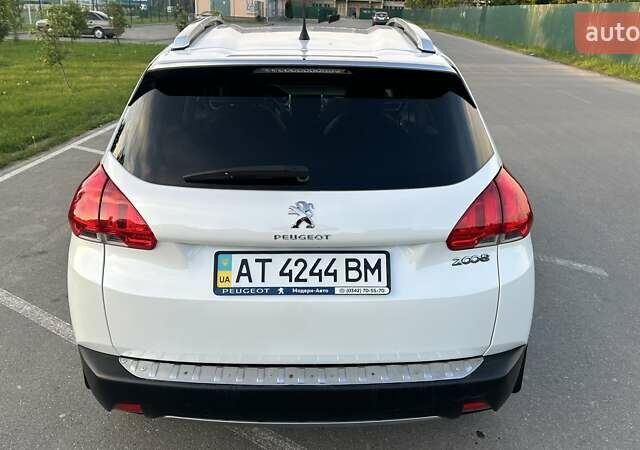 Білий Пежо 2008, об'ємом двигуна 1.2 л та пробігом 84 тис. км за 12800 $, фото 6 на Automoto.ua