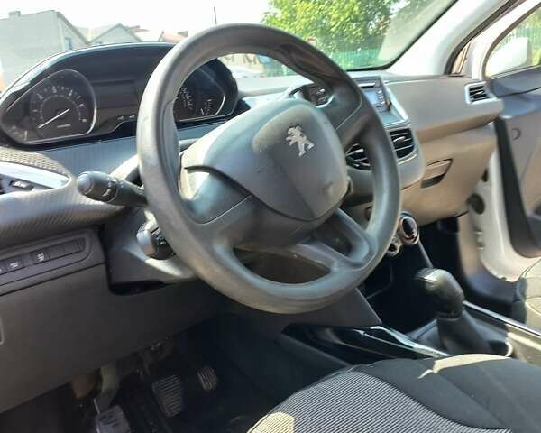 Білий Пежо 2008, об'ємом двигуна 1.56 л та пробігом 271 тис. км за 10240 $, фото 27 на Automoto.ua