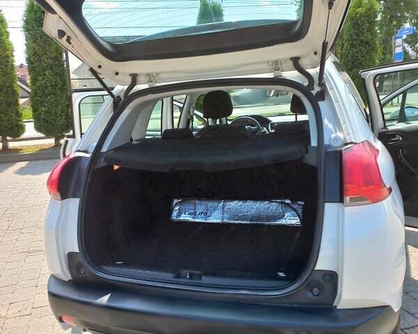 Білий Пежо 2008, об'ємом двигуна 1.56 л та пробігом 271 тис. км за 10240 $, фото 28 на Automoto.ua