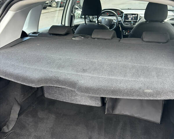 Белый Пежо 2008, объемом двигателя 1.2 л и пробегом 108 тыс. км за 11200 $, фото 10 на Automoto.ua