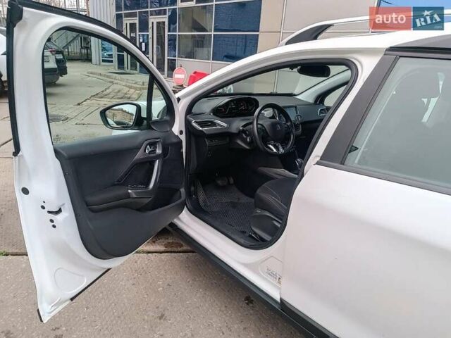 Белый Пежо 2008, объемом двигателя 1.2 л и пробегом 79 тыс. км за 11990 $, фото 16 на Automoto.ua