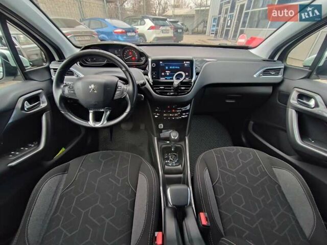 Белый Пежо 2008, объемом двигателя 1.2 л и пробегом 79 тыс. км за 11990 $, фото 13 на Automoto.ua