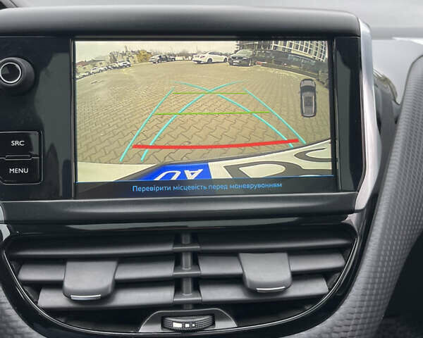 Білий Пежо 2008, об'ємом двигуна 1.2 л та пробігом 90 тис. км за 11299 $, фото 21 на Automoto.ua