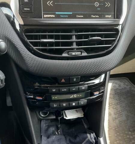 Білий Пежо 2008, об'ємом двигуна 1.2 л та пробігом 98 тис. км за 13000 $, фото 8 на Automoto.ua