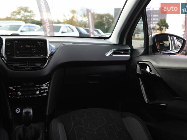 Белый Пежо 2008, объемом двигателя 1.2 л и пробегом 69 тыс. км за 11500 $, фото 12 на Automoto.ua