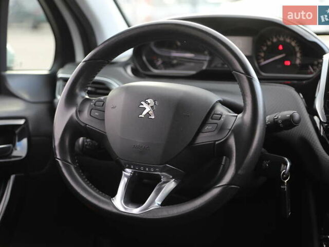 Белый Пежо 2008, объемом двигателя 1.2 л и пробегом 69 тыс. км за 11500 $, фото 13 на Automoto.ua