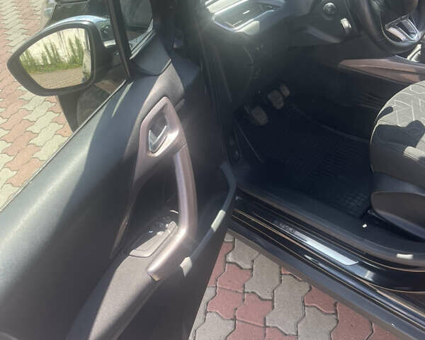 Чорний Пежо 2008, об'ємом двигуна 1.2 л та пробігом 57 тис. км за 8999 $, фото 18 на Automoto.ua