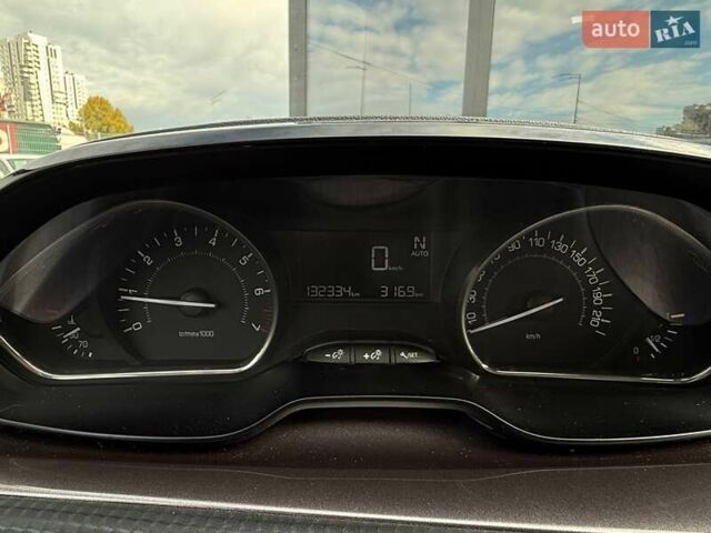 Пежо 2008 2013 у Києві на Automoto.ua Коричневий Пежо 2008, об'ємом двигуна 1.2 л та пробігом 130 тис. км за 8990 $, фото 18 на Automoto.ua