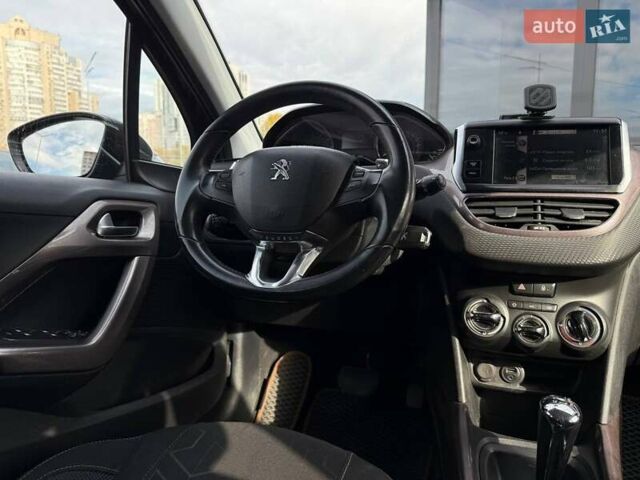 Пежо 2008 2013 у Києві на Automoto.ua Коричневий Пежо 2008, об'ємом двигуна 1.2 л та пробігом 130 тис. км за 8990 $, фото 13 на Automoto.ua