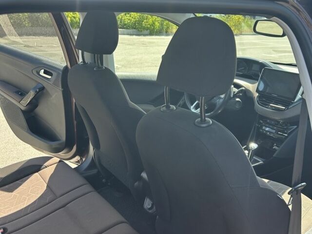 Коричневый Пежо 2008, объемом двигателя 1.2 л и пробегом 144 тыс. км за 8999 $, фото 4 на Automoto.ua